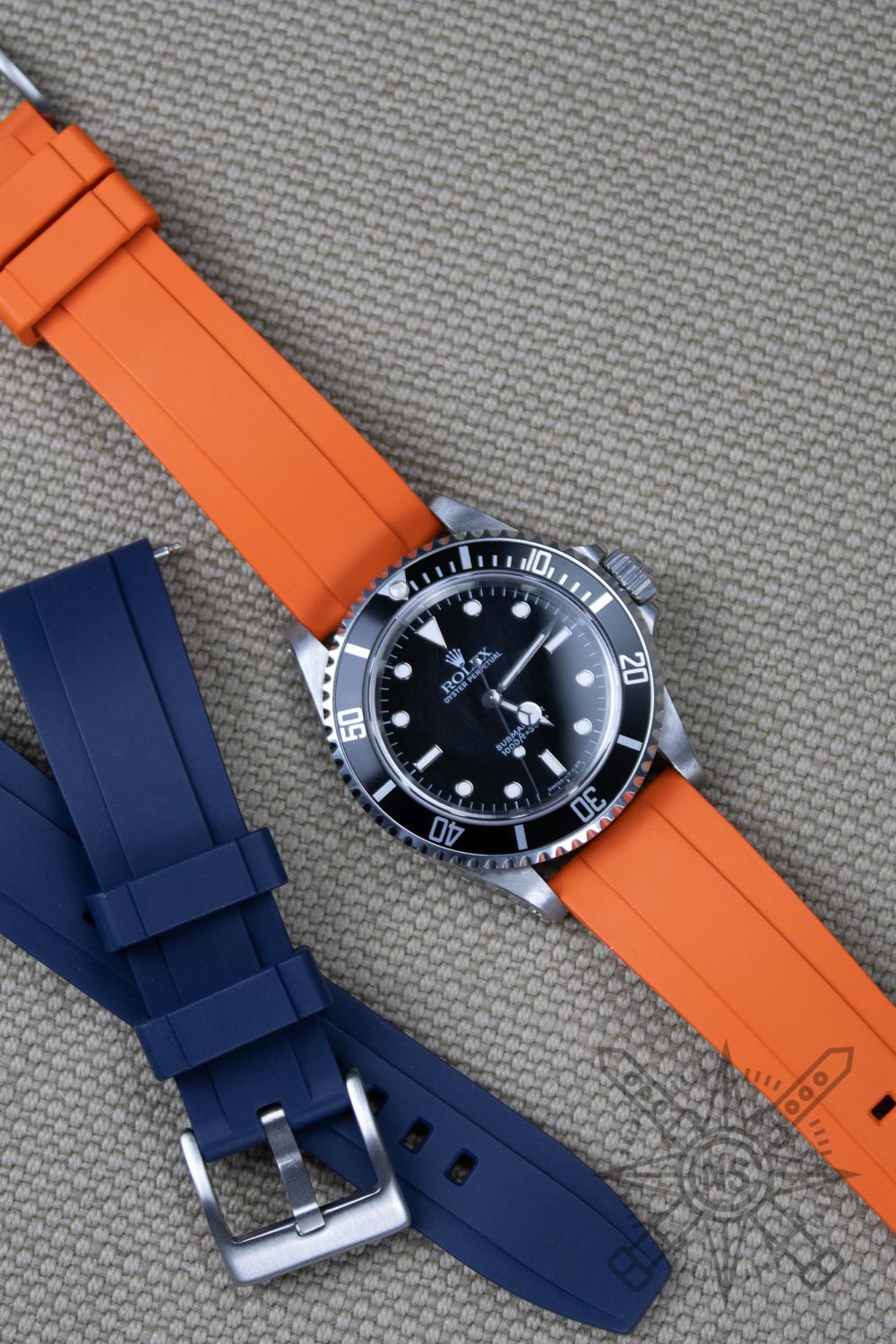 Rolex Submariner on a orange FKM rubber watch band